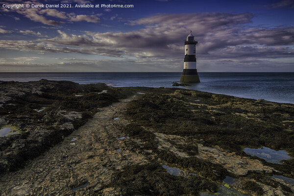 Sunset at Trwyn Du Lighthouse, Penmon, Anglesey  Picture Board by Derek Daniel