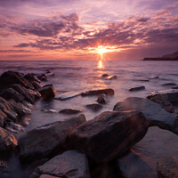 Buy canvas prints of Dazzling Sunset Over Jurassic Coast by Derek Daniel