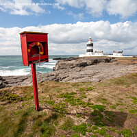 Buy canvas prints of Guiding Light of the Irish Coast by Derek Daniel