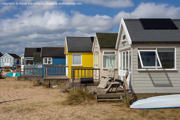 The Colourful Beach Huts at Hengistbury Head Picture Board by Derek Daniel