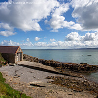Buy canvas prints of Slipway along the coast at Moelfre by Derek Daniel