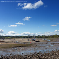 Buy canvas prints of The Magical Red Wharf Bay by Derek Daniel