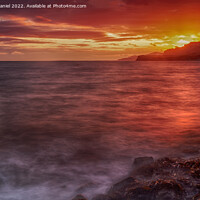 Buy canvas prints of Majestic Sunset over Jurassic Seascape by Derek Daniel