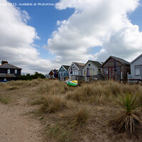 Buy canvas prints of Colourful Beach Huts on Hengistbury Head by Derek Daniel