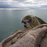Buy canvas prints of Majestic South Stack Lighthouse by Derek Daniel