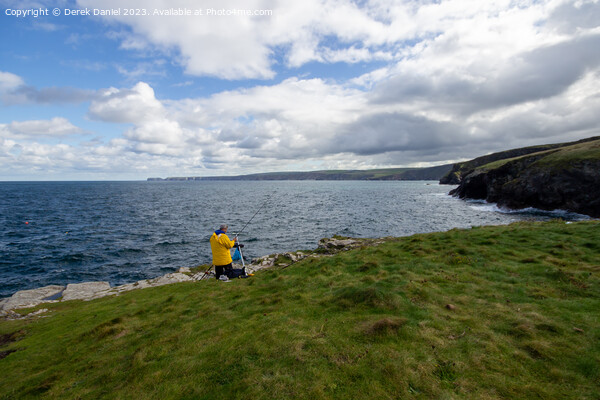 A Serene Fishing Spot on Cornwalls Rugged Headland Picture Board by Derek Daniel
