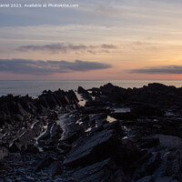 Buy canvas prints of Mesmerizing Sunset at Hartland Quay by Derek Daniel
