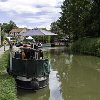 Buy canvas prints of Tranquil Canal Life by Derek Daniel