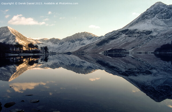 Snow capped mountains at Buttermere Picture Board by Derek Daniel