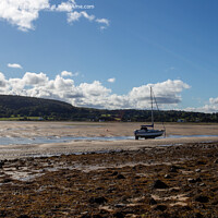 Buy canvas prints of Stranded Boat, Red Wharf Bay, Anglesey  by Derek Daniel