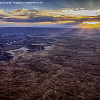 Buy canvas prints of Canyonlands National Park as the sun is setting by Derek Daniel