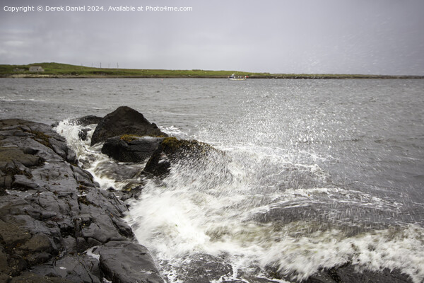 Waves crashing into the rocks at Staffin Bay Picture Board by Derek Daniel