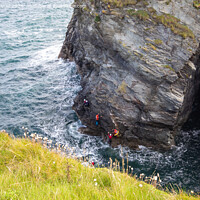 Buy canvas prints of Coasterring around the cliffs at Port Gaverne by Derek Daniel