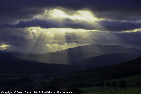 Pitlochry- Light beams on the hills Picture Board by Derek Daniel