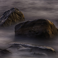 Buy canvas prints of Moving water around rocks in Kimmeridge Bay by Derek Daniel