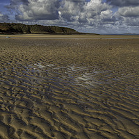 Buy canvas prints of The Wild Beauty of Lligwy Beach by Derek Daniel