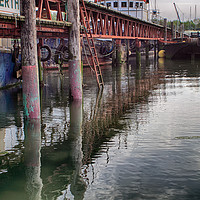Buy canvas prints of Rusty Reflections on Southampton Boat Berth by Derek Daniel