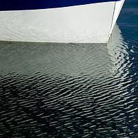 Buy canvas prints of Boat Reflection by Derek Daniel