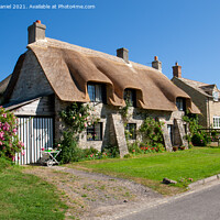 Buy canvas prints of Dorset Thatch cottage by Derek Daniel