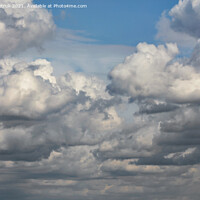 Buy canvas prints of Cumulus clouds are gradually covering the blue sky. by Sergii Petruk