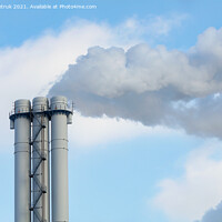 Buy canvas prints of Emissions of smoke and steam from an industrial chimney into a clear sky. by Sergii Petruk
