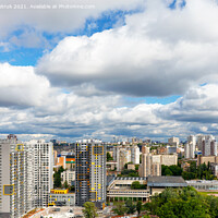 Buy canvas prints of Dramatic beautiful sky with thick clouds over residential areas of the city. by Sergii Petruk