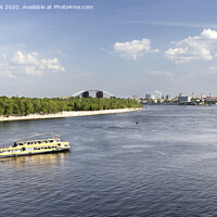 Buy canvas prints of Pleasure boat goes along the Dnipro river on a bright sunny day by Sergii Petruk