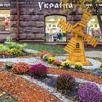 Buy canvas prints of bright color area in front of the store Ukraine in the center of Kyiv on a rainy day of October 2017 by Sergii Petruk