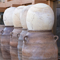 Buy canvas prints of Large clay pots in a row for sale by Sergii Petruk