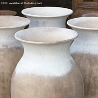 Buy canvas prints of Large clay amphorae for water in a row for sale by Sergii Petruk