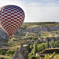 Buy canvas prints of A balloon is flying over the valley in Cappadocia by Sergii Petruk