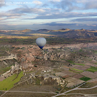 Buy canvas prints of A balloons is flying over the valley in Cappadocia by Sergii Petruk