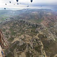 Buy canvas prints of A balloons is flying over the valley in Cappadocia by Sergii Petruk