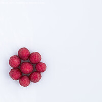 Buy canvas prints of Raspberries are arranged in a circle on a light background by Sergii Petruk