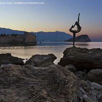 Buy canvas prints of The statue of Ballerina Dancer, standing on the rock. Budva, August 2018. by Sergii Petruk