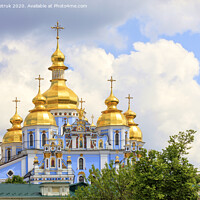 Buy canvas prints of The famous Golden-domed Michael's Cathedral in Kyiv in the spring against the blue cloudy sky by Sergii Petruk
