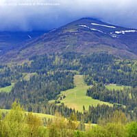 Buy canvas prints of The landscape of the majestic mountain in the Carpathians along the slope of which the cable lift is laid. by Sergii Petruk