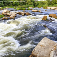 Buy canvas prints of The rapid flow of the river in the blur, rocky shores, boulders and rapids, bright green vegetation on the other side of the shore. by Sergii Petruk