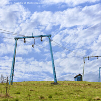Buy canvas prints of The framework of the mountain cable lift stand alone on the top of the mountain. by Sergii Petruk