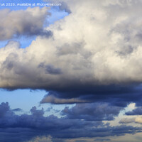 Buy canvas prints of Storm clouds gather in a pile closing off a blue sky by Sergii Petruk