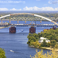 Buy canvas prints of Construction of the Podolsky bridge across the Dnipro in Kyiv, image taken from a height. by Sergii Petruk