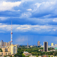 Buy canvas prints of TV tower and residential areas of Kyiv at noon against the backdrop of a stormy blue summer sky. by Sergii Petruk
