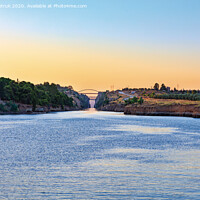 Buy canvas prints of The Corinth Canal in the morning summer day illuminates the bright rising sun of Greece. by Sergii Petruk