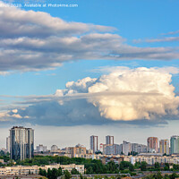 Buy canvas prints of A large curly figured cloud hung over the city. by Sergii Petruk