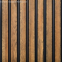 Buy canvas prints of A fence made of vertical wooden decorative strips located parallel to each other. by Sergii Petruk