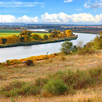 Buy canvas prints of A beautiful autumn landscape with a smooth bend of the river among the plain of fields. by Sergii Petruk