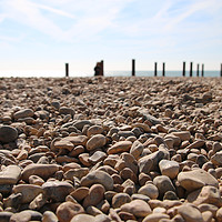 Buy canvas prints of Pebbles are the new sand by Charisse Carson