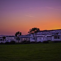 Buy canvas prints of Sunset over Devon Cliffs Holiday Park Exmouth by Will Badman