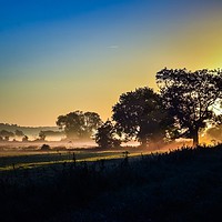 Buy canvas prints of Sunrise across the Somerset Levels Glastonbury Uk by Will Badman