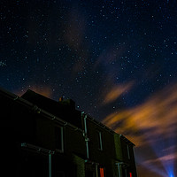Buy canvas prints of The stars above the houses by Kieran Bellis